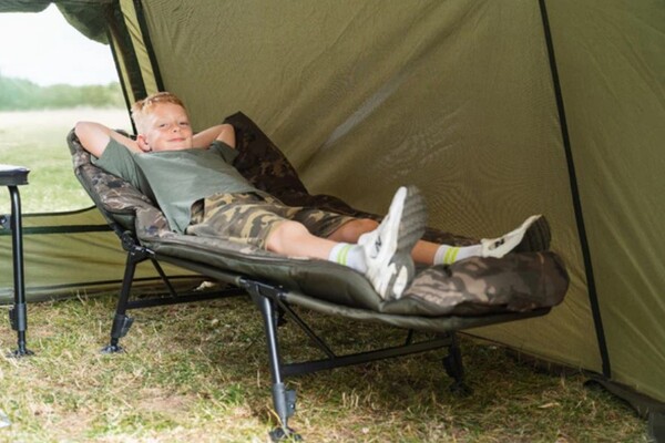 Nash Indulgence 4 Leg Junior Sleep System Camo Bedchair (Incl. Blanket)